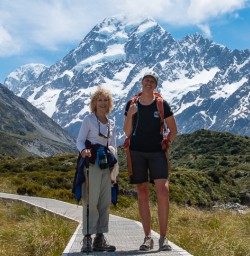 Guide and guest on Hooker Valley boardwalk