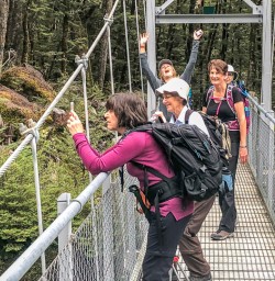 Ladies on Routeburn Track River Bridge, Otago New Zealand