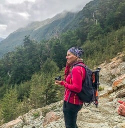 Lady at Routeburn track valley, otago new zealand