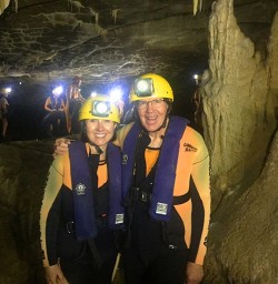 happy couple in the nile river caves new zealand