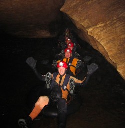 Tubing the underground river at the Nile River Glowworm Caves