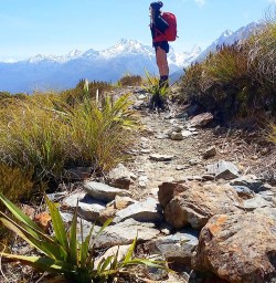 NZT guide Grace checking out the View from the Routeburn Track