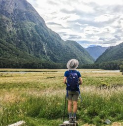 lady at routeburn track valley, otago new zealand