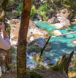 Taking picture at Routeburn track river, Otago New Zealand