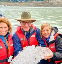 2. Glacier explorer boat guest holding ice