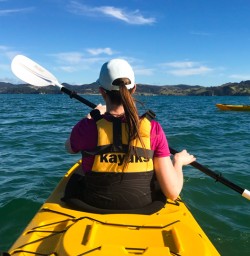 2. Guest kayaking to Cathedral Cove