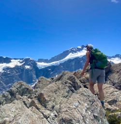 2. Solo guest climbing rocks Sealy Tarns
