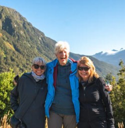 2. Three happy guests Milford Road lookout