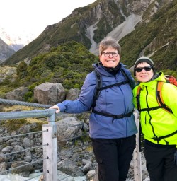 2. Two happy guests on bridge Hooker Valley