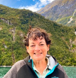 2. Solo guest and waterfall Milford Sound