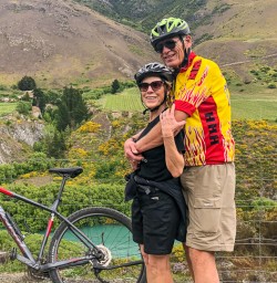 Couple biking Queenstown trail network