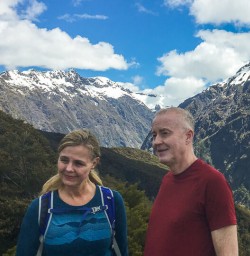 Couple at Key Summit Lookout Trail Lake, Fiordland New Zealand