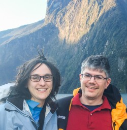 Couple at Stirling Falls, Milford Sound Fiordland Southland New Zealand