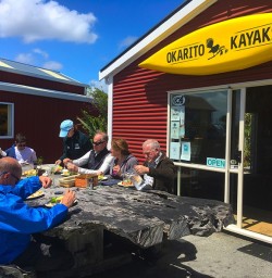 Tucking into a picnic lunch before heading out on Okarito Lagoon
