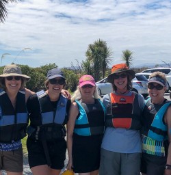 Group ready to kayak at Okarito Lagoon, West Coast New Zealand