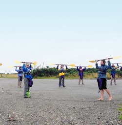practicing kayaking at okarito lagoon new zealand