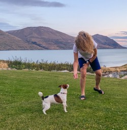 Playing with dog at Lake Ohau Quarters, Canterbury New Zealand