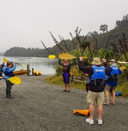 Practicing kayak at Okarito Lagoon, West Coast New Zealand
