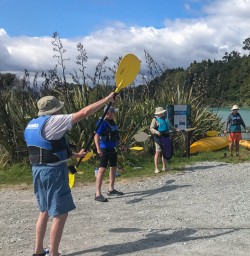 Practicing kayak at Okarito Lagoon, West Coast New Zealand