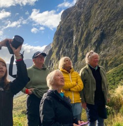 3.5 Guests taking photos on drive out of Milford Sound