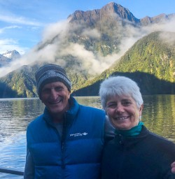Couple on the boat at Milford Sound, Fiordland New Zealand