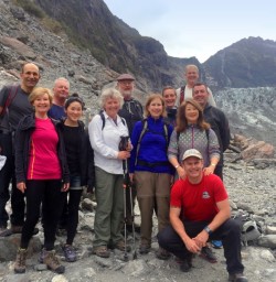 hiking group at fox glacier new zealand