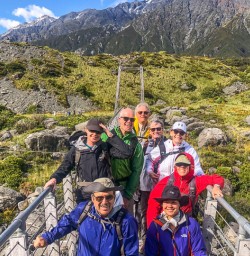 Group on the bridge at Hooker Valley Track, Aoraki Mt Cook Canterbury New Zealand