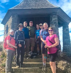 Guests hiking sunny Bridle path