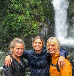 Ladies at Hidden Falls, Hollyford Track, Fiordland National Park Southland New Zealand