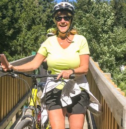 Lady at Arrow River Bridges Ride, Otago New Zealand