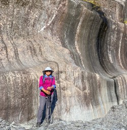 Lady at Waiho river, Fox glacier, West Coast New Zealand
