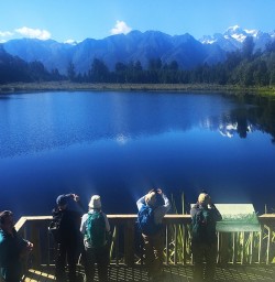 enjoying the reflections at lake matheson new zealand