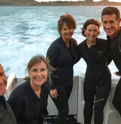 4. Five happy guests Dolphin Swim sunrise