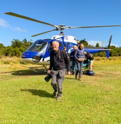 4. Guests getting out the heli Martins Bay
