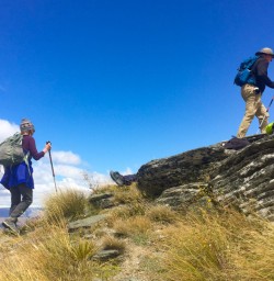 4. Guests hiking up Rock Peak