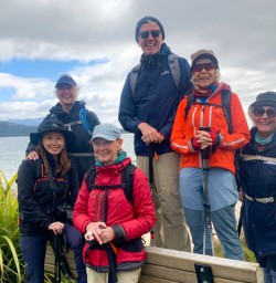 4. Guests on beach at Stewart Island