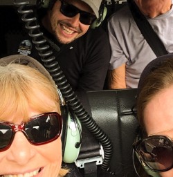 4. Guide and guests on Heli to Martins Bay