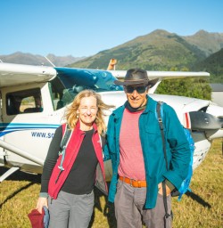 4. Two guests about to board bush plane to Siberia