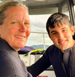 4. Two guests ready for dolphin swim