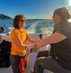 5 Guests enjoy boat trip and dolphin swim