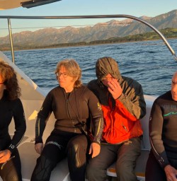 5 Guests on boat for dolphin swim