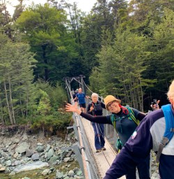 5 Guests on bridge Routeburn Track