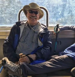Couple on the boat at Arthur river, Fiordland New Zealand