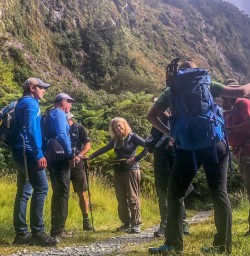 Group at Milford Track, Arthur river, Fiordland New Zealand