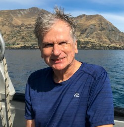 Happy guest on the boat at Lake Wanaka, Otago New Zealand