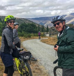 Happy cyclist at Arrowtown, Otago New Zealand