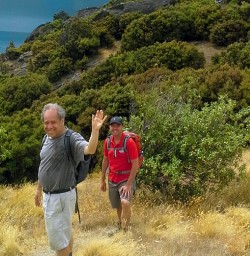 walkers and guide on mou waho island lake wanaka new zealand
