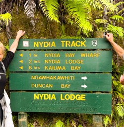 5. Two guests by Nydia Track sign