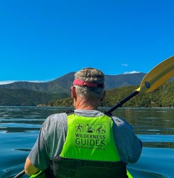 Guest kayaking Queen Charlotte Sound