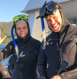 Couple on the boat at Kaikoura, Canterbury New Zealand